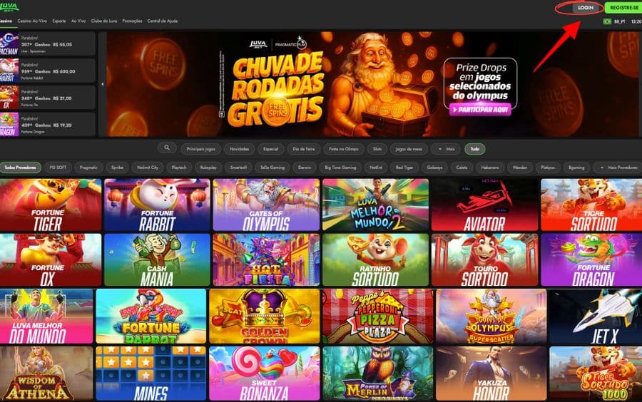 Página inicial do site Luva Bet com uma seta vermelha apontando para o botão 'LOGIN' no canto superior direito.