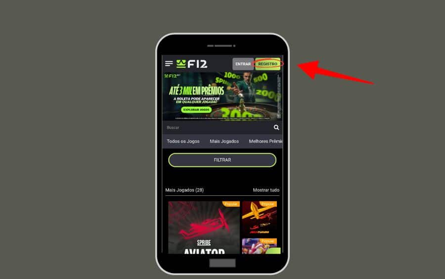 Visão geral da página inicial do site F12.bet, destacando com uma seta a localização do botão 'Registro', o primeiro passo para criar uma conta.