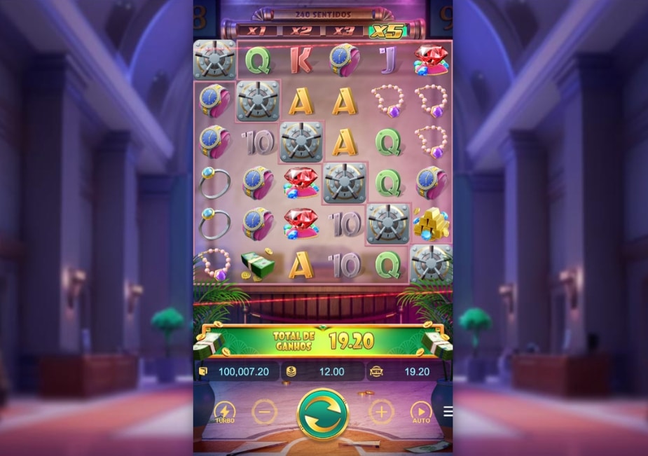 Tela do slot Wild Heist Cashout com cofres em diagonal, joias e dinheiro entre os símbolos, multiplicador x5 no topo e total de ganhos de 19,20 em destaque.