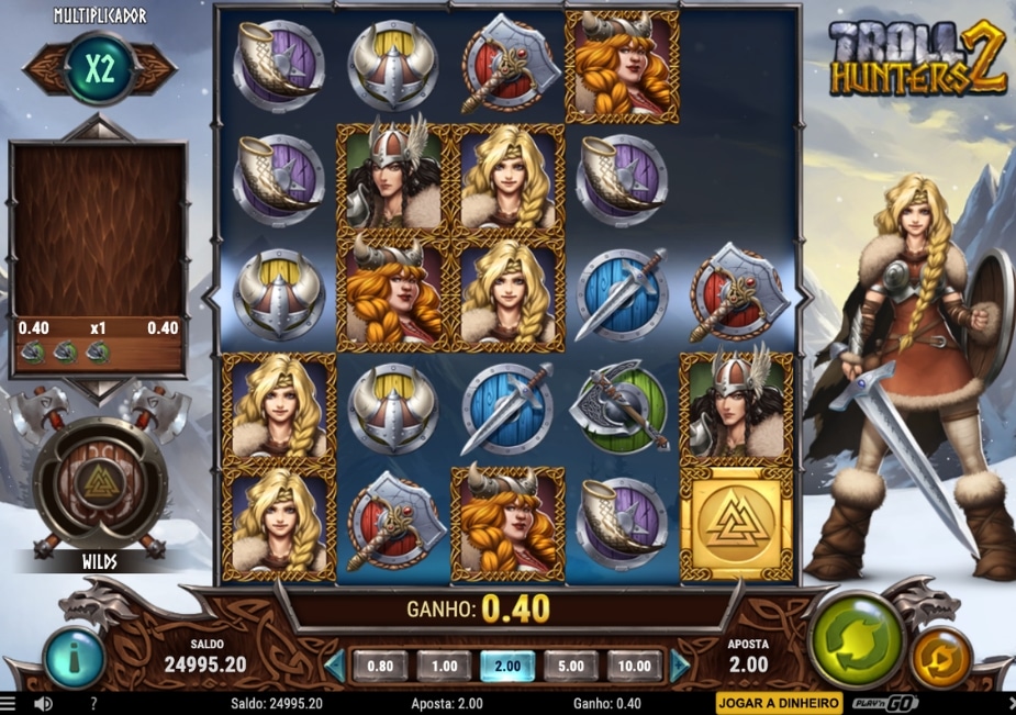 Slot Troll Hunters 2 com guerreiras vikings, símbolos nórdicos e ganho nos rolos.